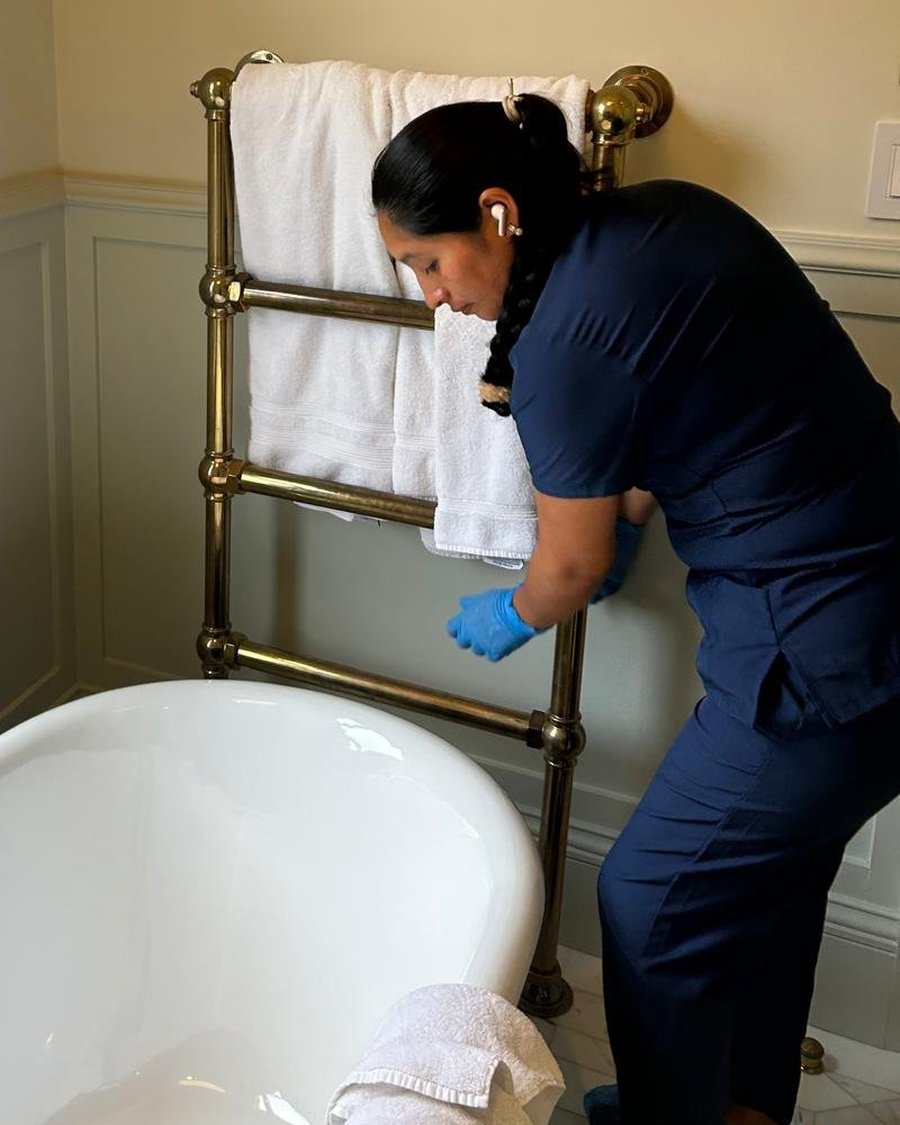 Luxury bathroom with a freestanding bathtub cleaned by Royal Glow Cleaning