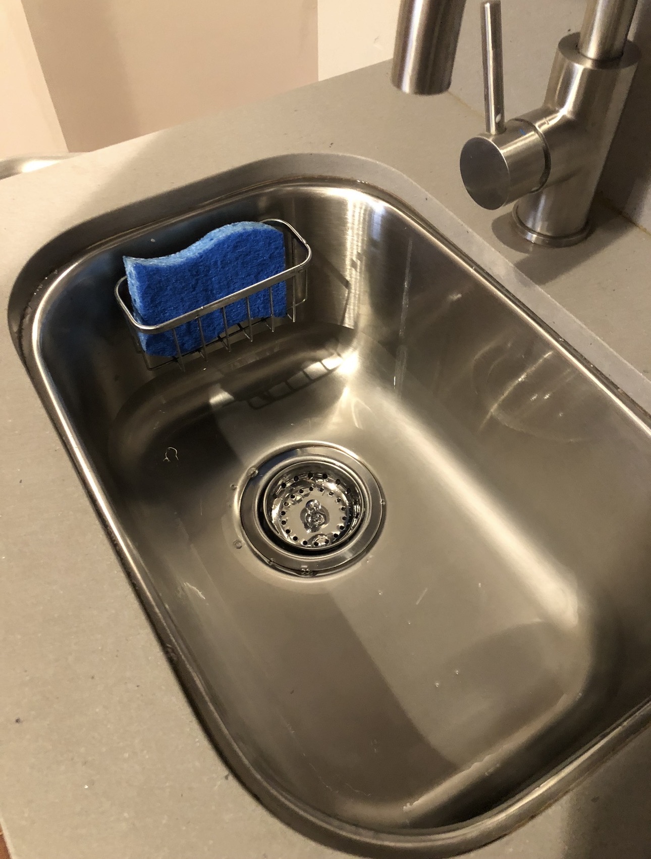 Shining stainless kitchen sink after Royal Glow Cleaning