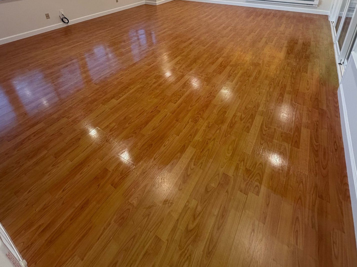 Shiny clean floor after a Royal Glow Cleaning visit